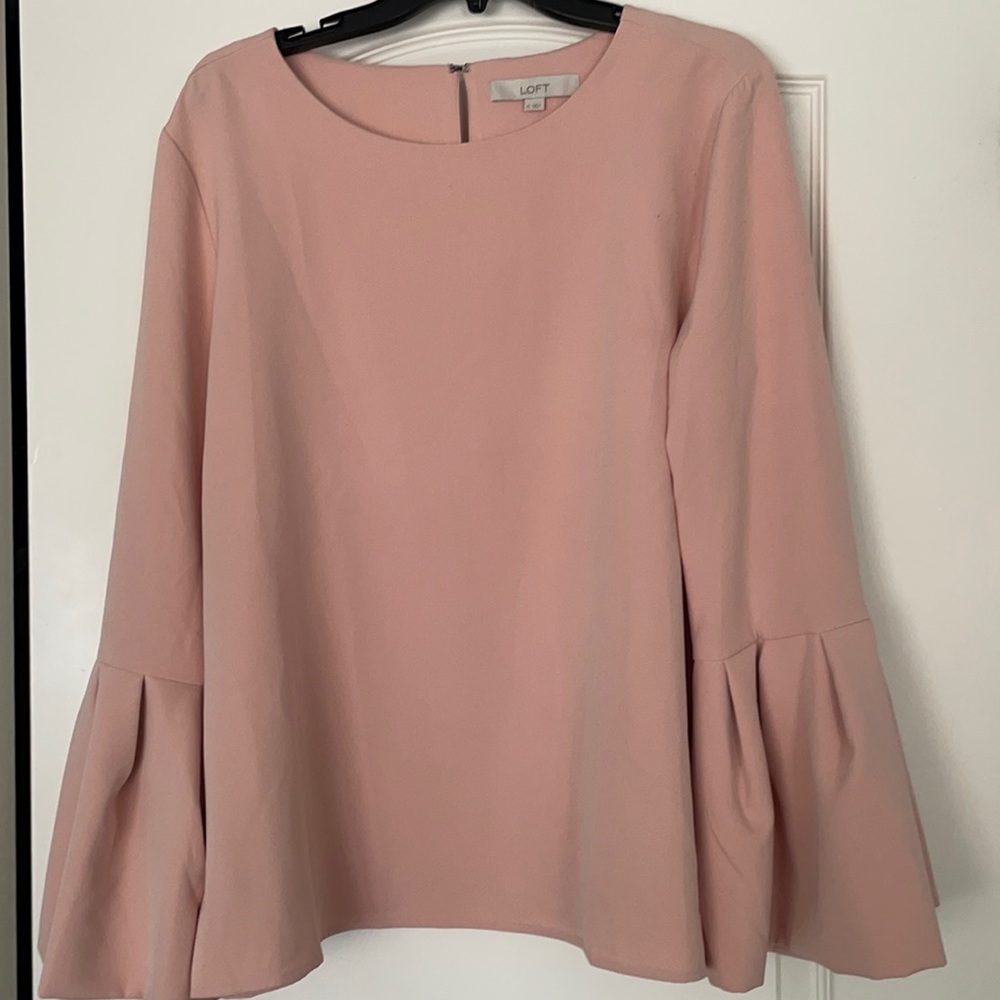 Top with bell sleeves
